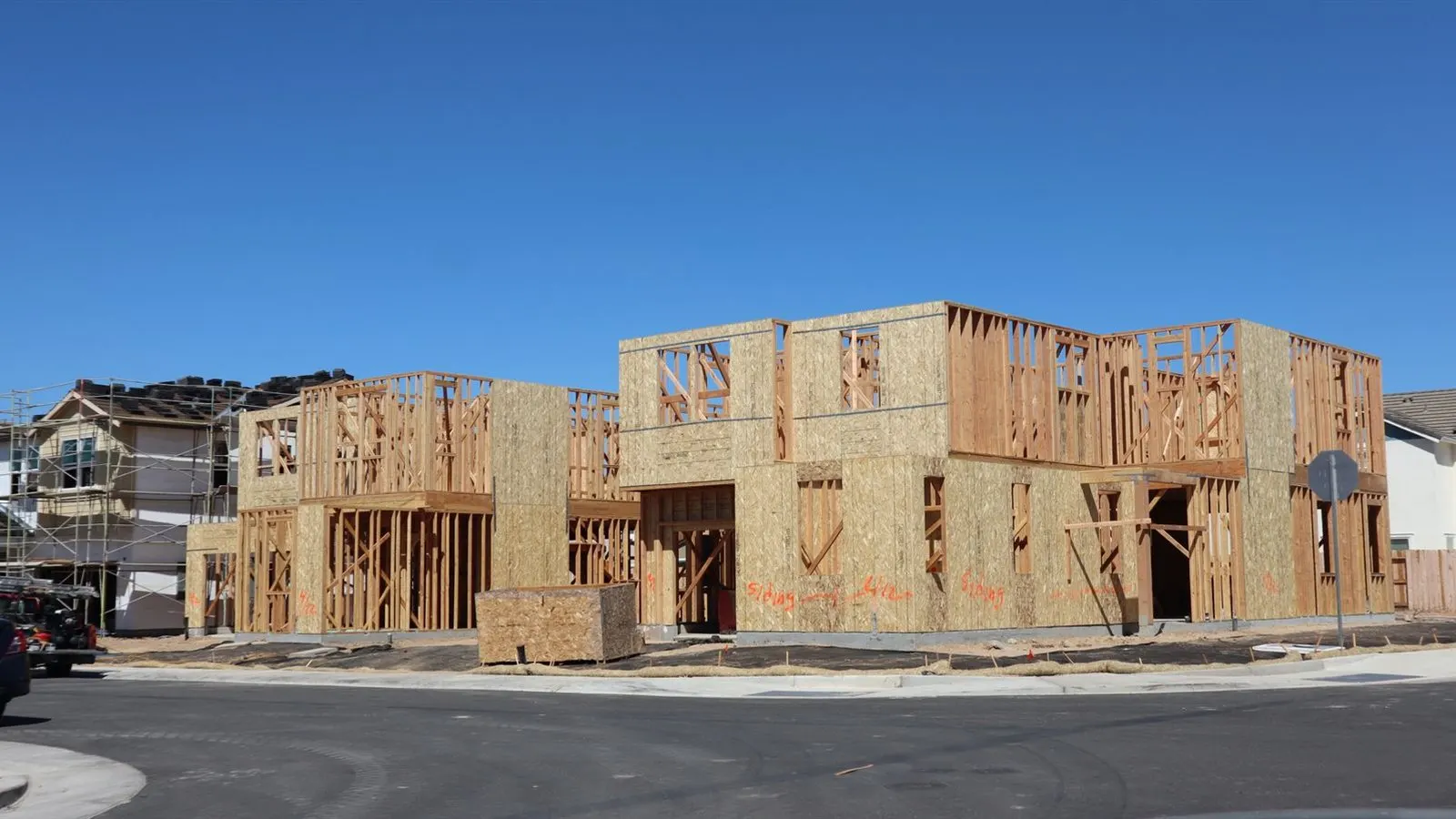 New residential construction with wood framing ready for window installation